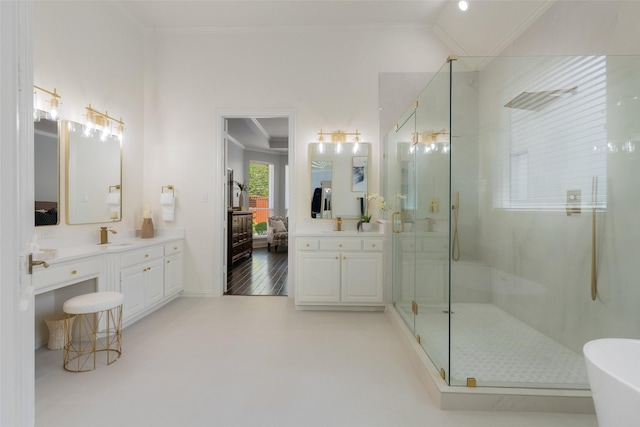5617 Lindsey Dr, Plano, TX 75093 - full bathroom with a shower stall, crown molding, vanity, and a freestanding tub