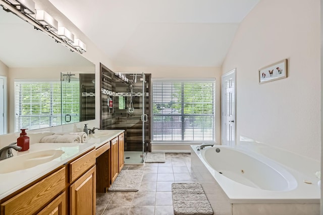 631 Ridgemont Dr, Allen, TX 75002 - bathroom with lofted ceiling, plenty of natural light, a whirlpool tub, a stall shower, and double vanity