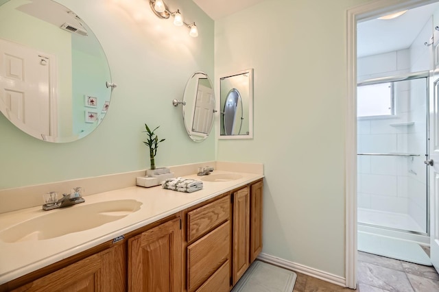 631 Ridgemont Dr, Allen, TX 75002 - bathroom with a shower with door, double vanity, and baseboards