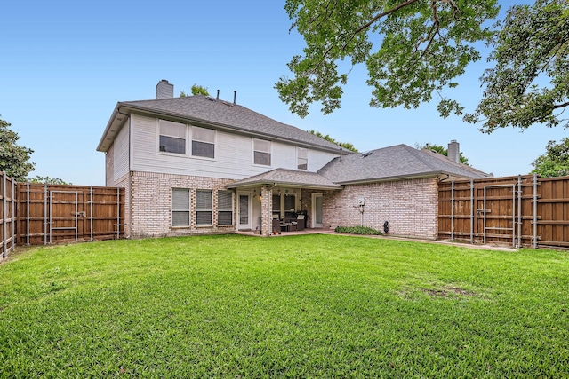 631 Ridgemont Dr, Allen, TX 75002 - rear view of house featuring a chimney, brick siding, a patio, and a gate