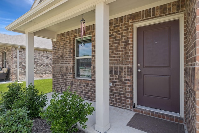 1713 Claireborne Ct, Little Elm, TX 75068 - entrance to property featuring a porch and brick siding