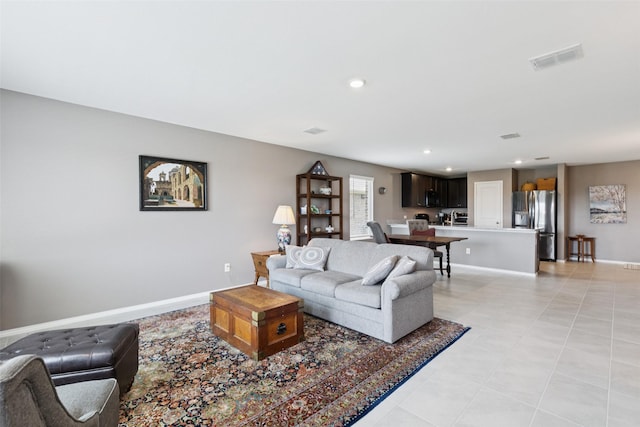 1713 Claireborne Ct, Little Elm, TX 75068 - living area featuring recessed lighting, baseboards, and light tile patterned floors