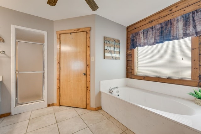 14213 Clark Dr, Streetman, TX 75859 - bathroom with a ceiling fan, a garden tub, a shower stall, and tile patterned floors