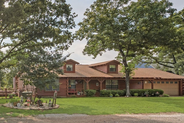 14213 Clark Dr, Streetman, TX 75859 - log cabin featuring a front lawn, an attached garage, log siding, and roof with shingles