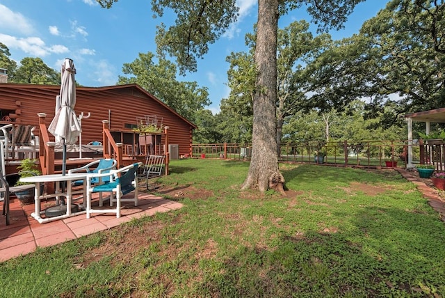14213 Clark Dr, Streetman, TX 75859 - fenced backyard featuring a patio