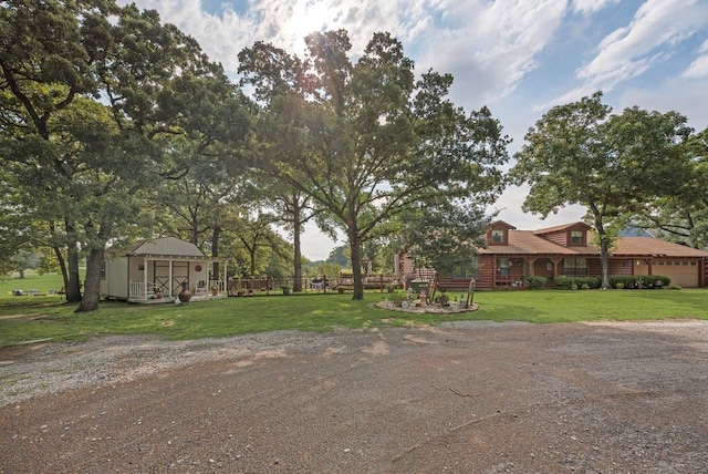 14213 Clark Dr, Streetman, TX 75859 - view of front facade with an outbuilding