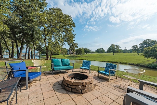 14213 Clark Dr, Streetman, TX 75859 - view of patio / terrace with an outdoor fire pit and a water view
