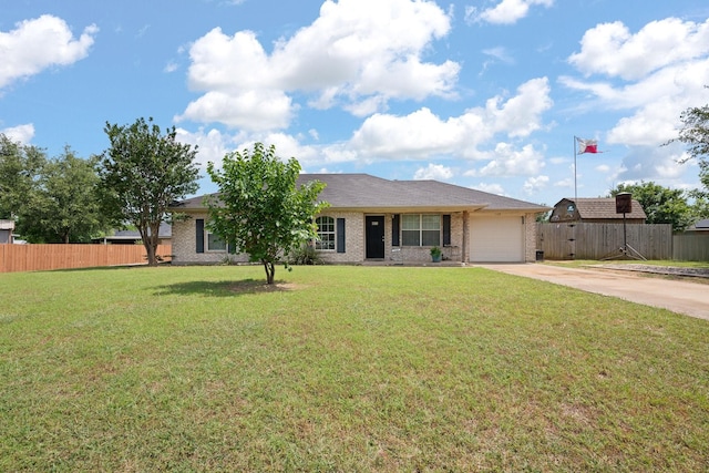 1105 Ashwood Ct, Cleburne, TX 76033 - single story home featuring driveway, an attached garage, and brick siding