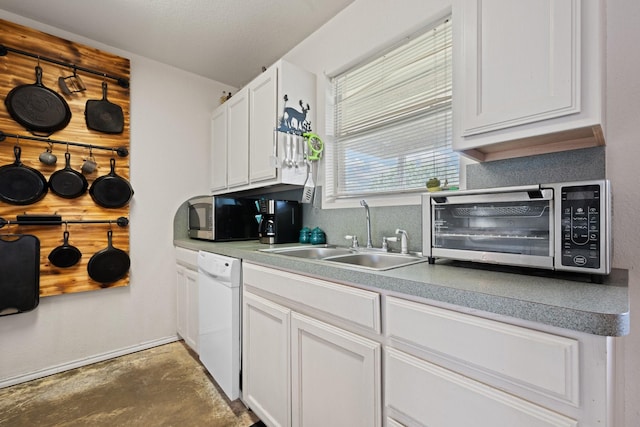 1105 Ashwood Ct, Cleburne, TX 76033 - kitchen with white dishwasher, a sink, white cabinets, concrete flooring, and light countertops