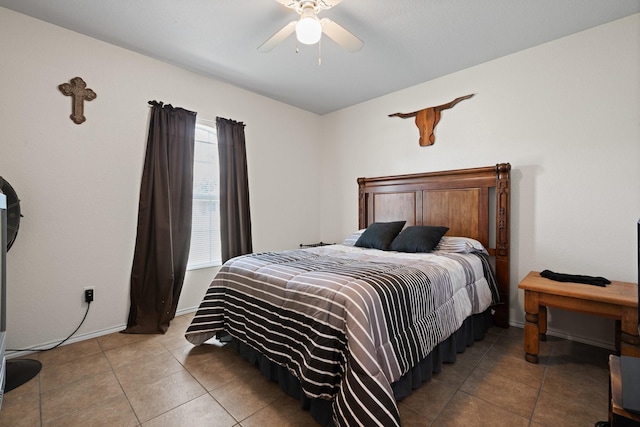 1105 Ashwood Ct, Cleburne, TX 76033 - tiled bedroom featuring baseboards and a ceiling fan