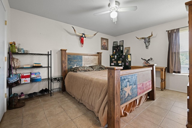 1105 Ashwood Ct, Cleburne, TX 76033 - bedroom featuring light tile patterned flooring, ceiling fan, and baseboards