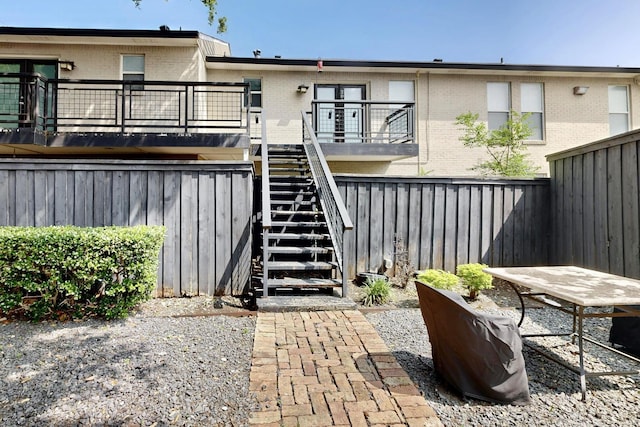 7736 Meadow Rd Unit 203, Dallas, TX 75230 - fenced backyard featuring stairway