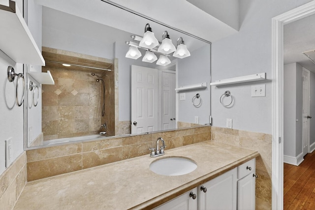 7736 Meadow Rd Unit 203, Dallas, TX 75230 - full bath featuring tiled shower / bath combo and vanity