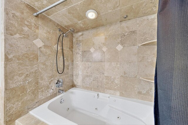 7736 Meadow Rd Unit 203, Dallas, TX 75230 - bathroom with a combined bath / shower with jetted tub