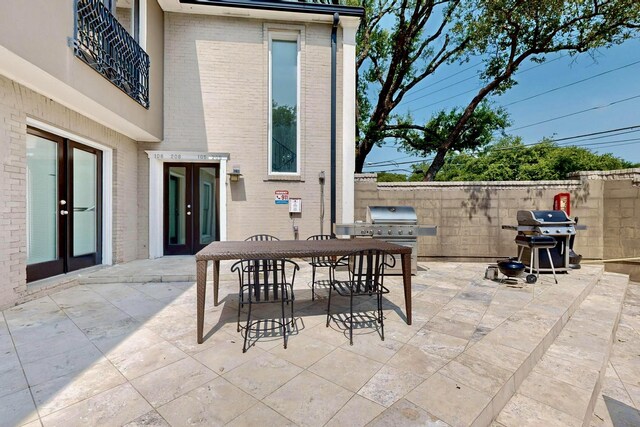 7736 Meadow Rd Unit 203, Dallas, TX 75230 - patio / terrace featuring french doors, a grill, and a patio area