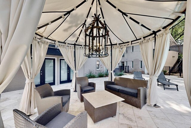 7736 Meadow Rd Unit 203, Dallas, TX 75230 - view of patio with a gazebo and an outdoor living space