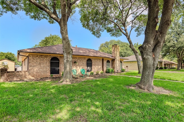 809 Monique, Cedar Hill, TX 75104 - ranch-style home with a chimney, a front lawn, and brick siding