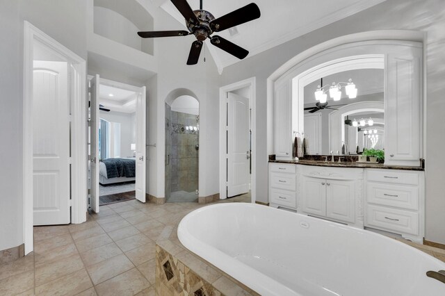 4340 Powers Branch Dr, Midlothian, TX 76065 - full bathroom featuring tiled bath, a chandelier, ornamental molding, vanity, and ceiling fan