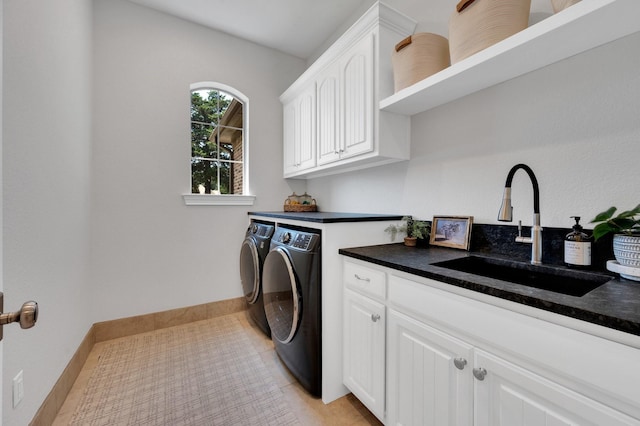 4340 Powers Branch Dr, Midlothian, TX 76065 - washroom featuring washing machine and dryer, cabinet space, and light tile patterned floors