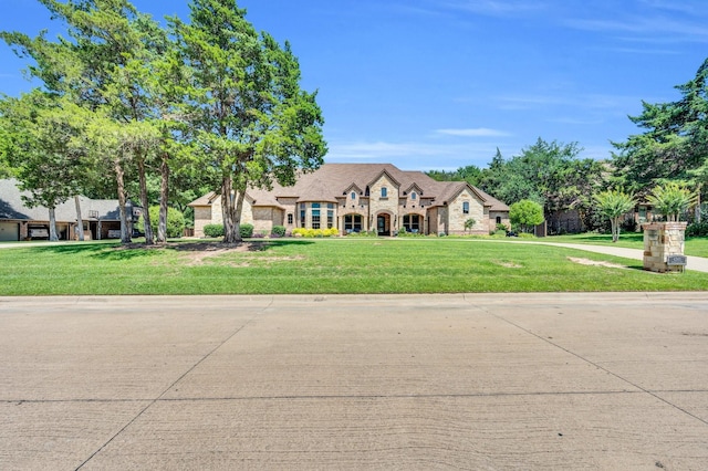 4340 Powers Branch Dr, Midlothian, TX 76065 - french provincial home with a front lawn, stone siding, and brick siding
