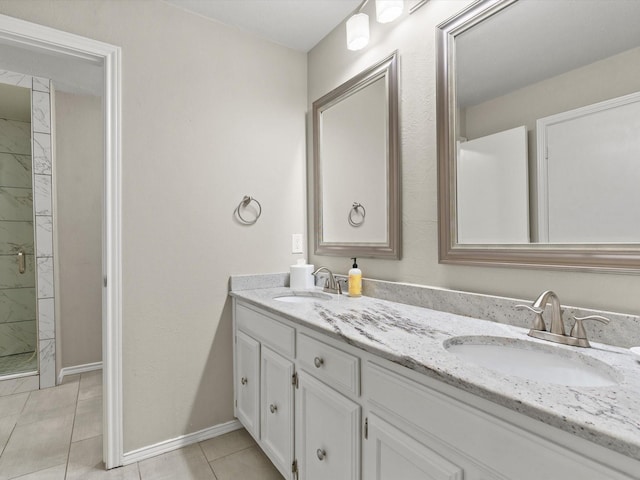 1507 Summertree Ct, Richardson, TX 75082 - full bath featuring double vanity, a stall shower, baseboards, and tile patterned flooring