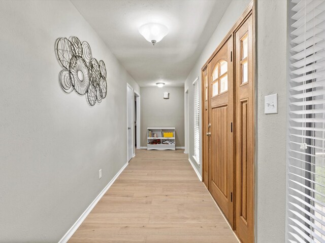 1507 Summertree Ct, Richardson, TX 75082 - corridor featuring light wood-type flooring and baseboards