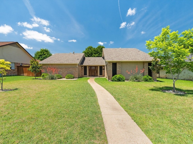 1507 Summertree Ct, Richardson, TX 75082 - view of front of house featuring brick siding and a shingled roof