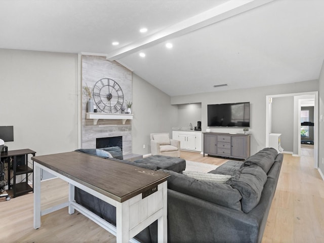 1507 Summertree Ct, Richardson, TX 75082 - living area with light wood-type flooring, a tile fireplace, baseboards, and recessed lighting