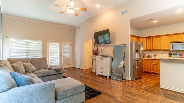 2231 Cobblestone Ct, Granbury, TX 76049 - living room featuring ornamental molding, a ceiling fan, dark wood-type flooring, high vaulted ceiling, and baseboards