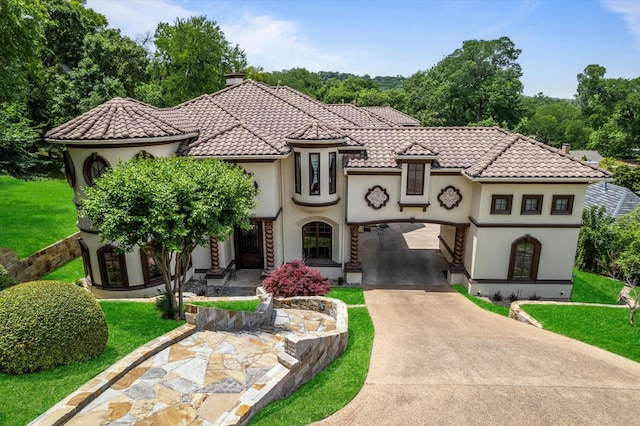 1608 Rivercrest Ct, Fort Worth, TX 76107 - mediterranean / spanish-style home with driveway, a chimney, a front lawn, and a tiled roof