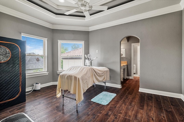1608 Rivercrest Ct, Fort Worth, TX 76107 - dining room featuring arched walkways, ornamental molding, wood-type flooring, a tray ceiling, and ceiling fan