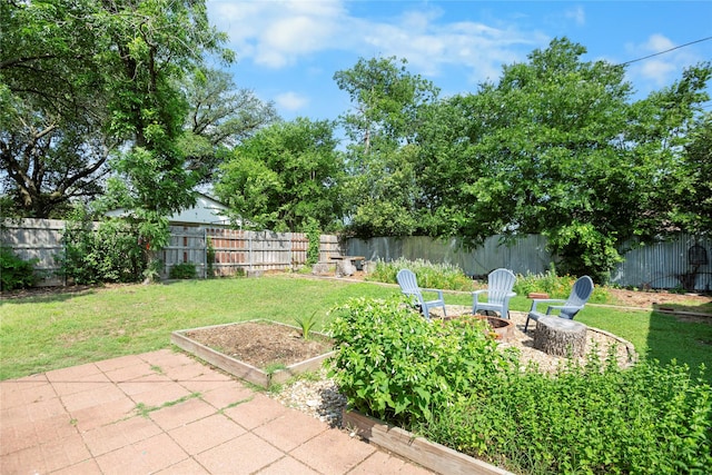 3819 Hubby Ave, Waco, TX 76710 - view of yard with a patio and a fire pit