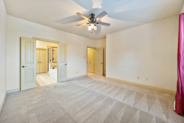 1891 Signal Ridge Pl, Rockwall, TX 75032 - unfurnished bedroom featuring carpet, baseboards, ensuite bath, and a ceiling fan