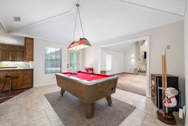 2126 Los Robles St, Grapevine, TX 76051 - game room with vaulted ceiling, light tile patterned flooring, pool table, baseboards, and a fireplace