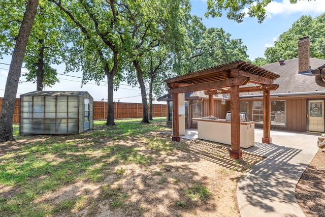 2126 Los Robles St, Grapevine, TX 76051 - view of yard with a pergola, a patio area, an outbuilding, and an exterior structure