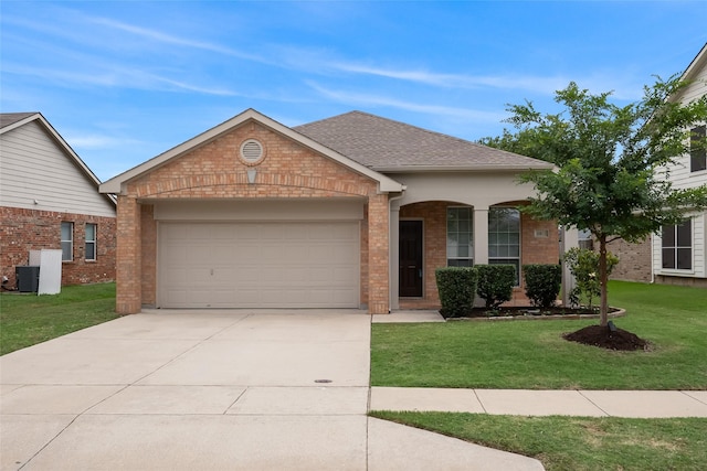 10833 Hawks Landing Rd, Fort Worth, TX 76052 - ranch-style house with brick siding, an attached garage, a front lawn, concrete driveway, and roof with shingles