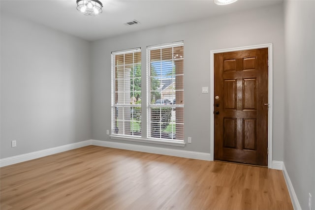 10833 Hawks Landing Rd, Fort Worth, TX 76052 - foyer entrance with light wood-type flooring and baseboards