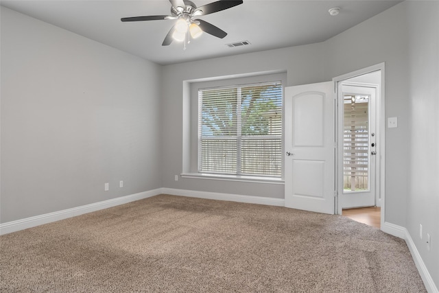 10833 Hawks Landing Rd, Fort Worth, TX 76052 - unfurnished room with light colored carpet, baseboards, ceiling fan, and a smoke detector