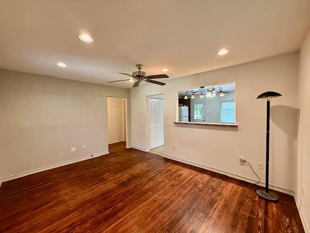 511 W Bonham Ave, Cooper, TX 75432 - unfurnished bedroom featuring freestanding refrigerator, wood finished floors, recessed lighting, baseboards, and a ceiling fan