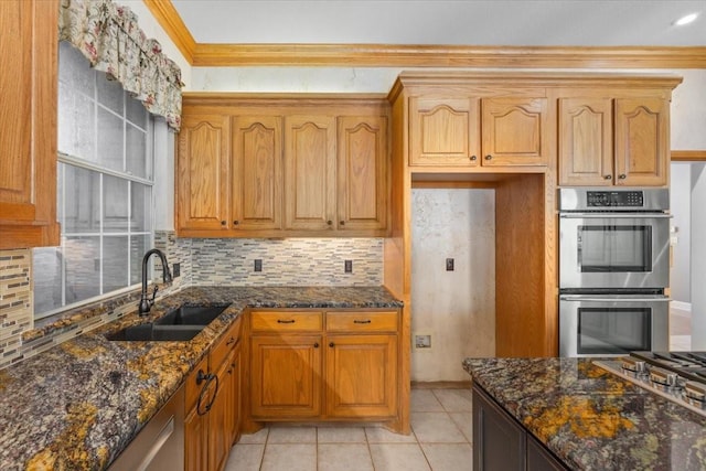 3633 Cliff View Loop, Weatherford, TX 76087 - kitchen with a sink, stainless steel double oven, backsplash, dark stone counters, and gas stovetop