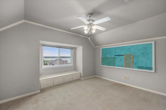 3633 Cliff View Loop, Weatherford, TX 76087 - empty room featuring lofted ceiling, a ceiling fan, light colored carpet, baseboards, and crown molding