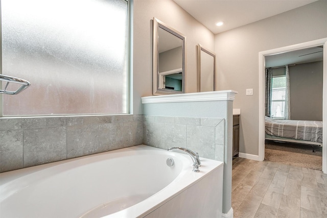 817 Nicole Way, Fort Worth, TX 76028 - full bath featuring vanity, a bath, and wood finished floors