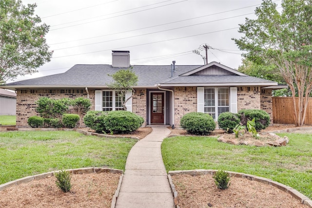 4000 Via Plata, Mesquite, TX 75150 - view of front facade with brick siding and roof with shingles