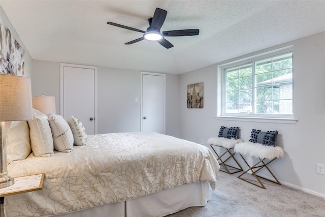 4000 Via Plata, Mesquite, TX 75150 - carpeted bedroom with baseboards, a textured ceiling, and ceiling fan