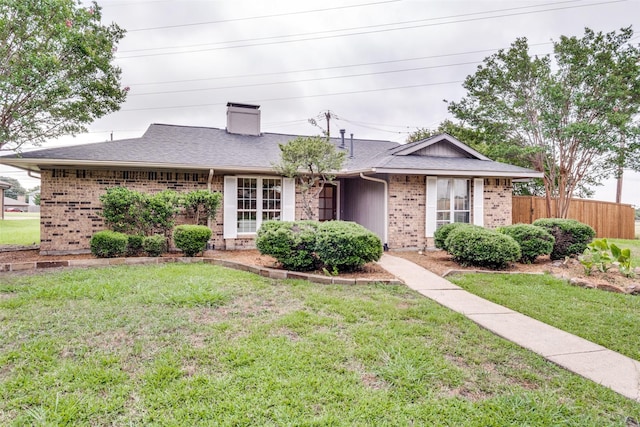 4000 Via Plata, Mesquite, TX 75150 - ranch-style home featuring brick siding, a chimney, and roof with shingles