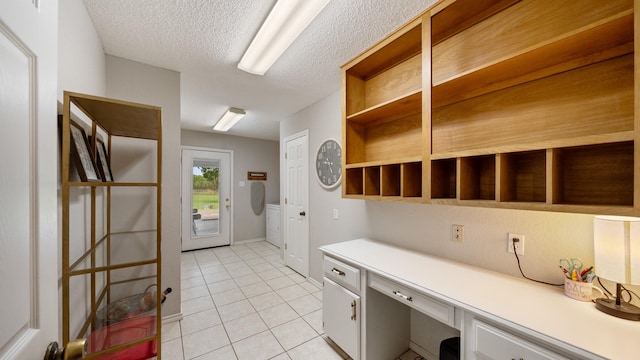 5691 Priscilla Ln, Kaufman, TX 75142 - doorway featuring light tile patterned floors and a textured ceiling