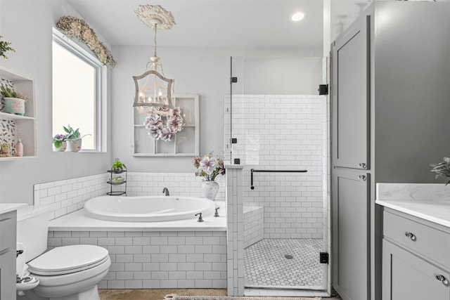 243 Fm 203, Walnut Springs, TX 76690 - full bath with vanity, a shower stall, a bath, a chandelier, and toilet