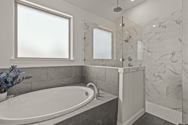 381 Oak Meadow Ln, Weatherford, TX 76085 - full bath featuring a garden tub, walk in shower, and tile patterned floors