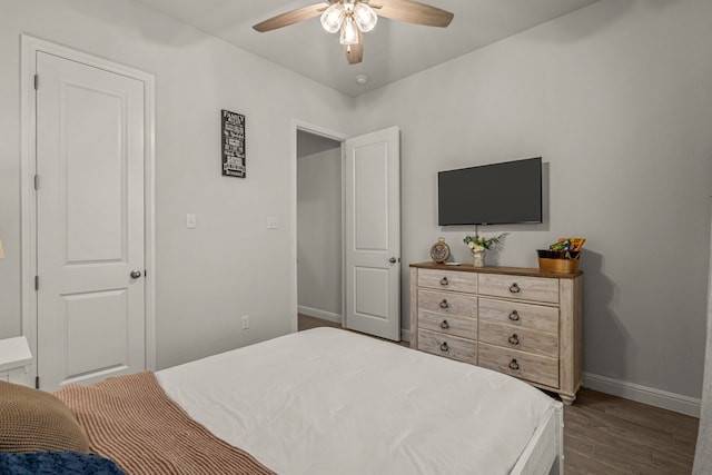 381 Oak Meadow Ln, Weatherford, TX 76085 - bedroom featuring baseboards, dark wood-style floors, and ceiling fan