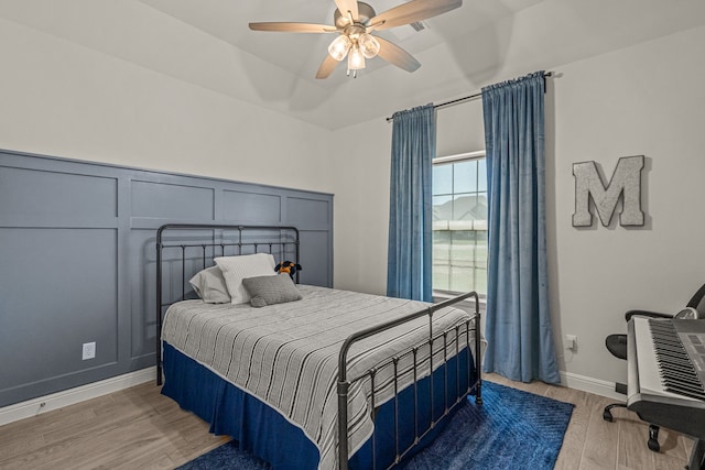 381 Oak Meadow Ln, Weatherford, TX 76085 - bedroom with light wood finished floors, baseboards, and ceiling fan